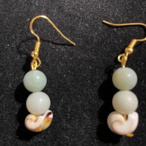 Brand new handmade beaded gold colored earrings.